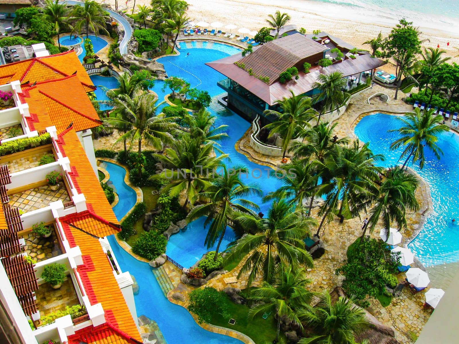 Bali, Indonesia - December 30,2008: The pools and beach of ocean taken in Nusa Dua Grand Nikko Bali. Hotel is located in Nusa Dua, Bali.
