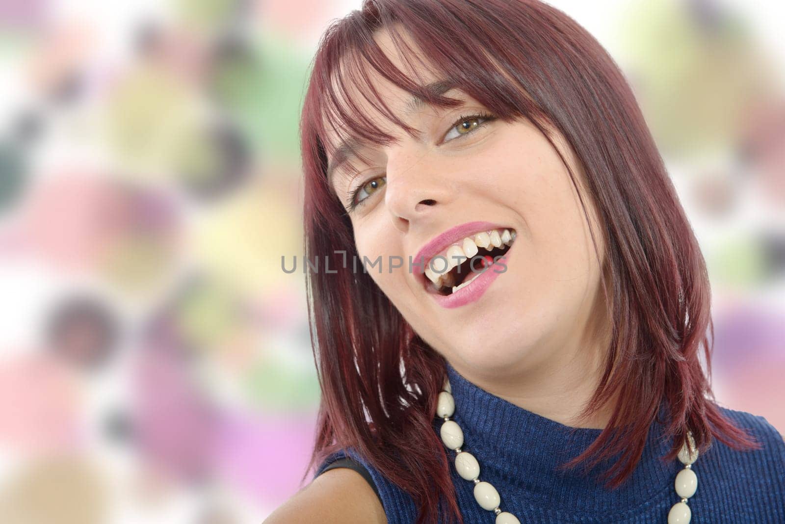 beautiful young woman with red hairs, bokeh background