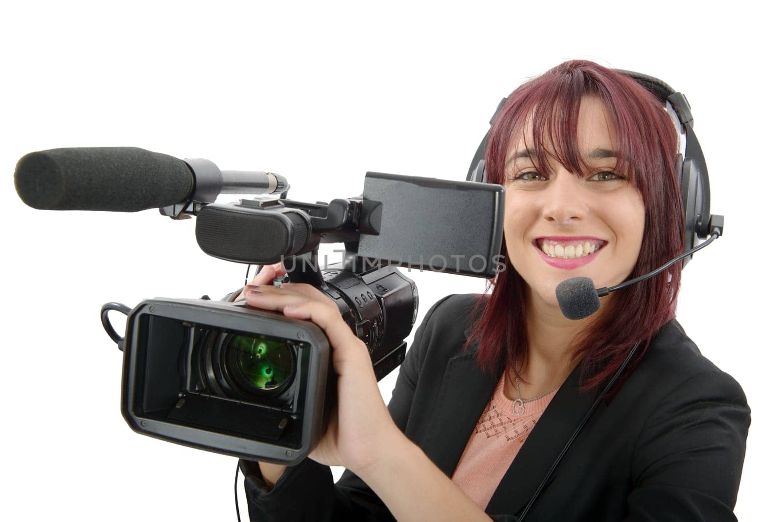 a beautiful young woman with a professional video camera and headphone