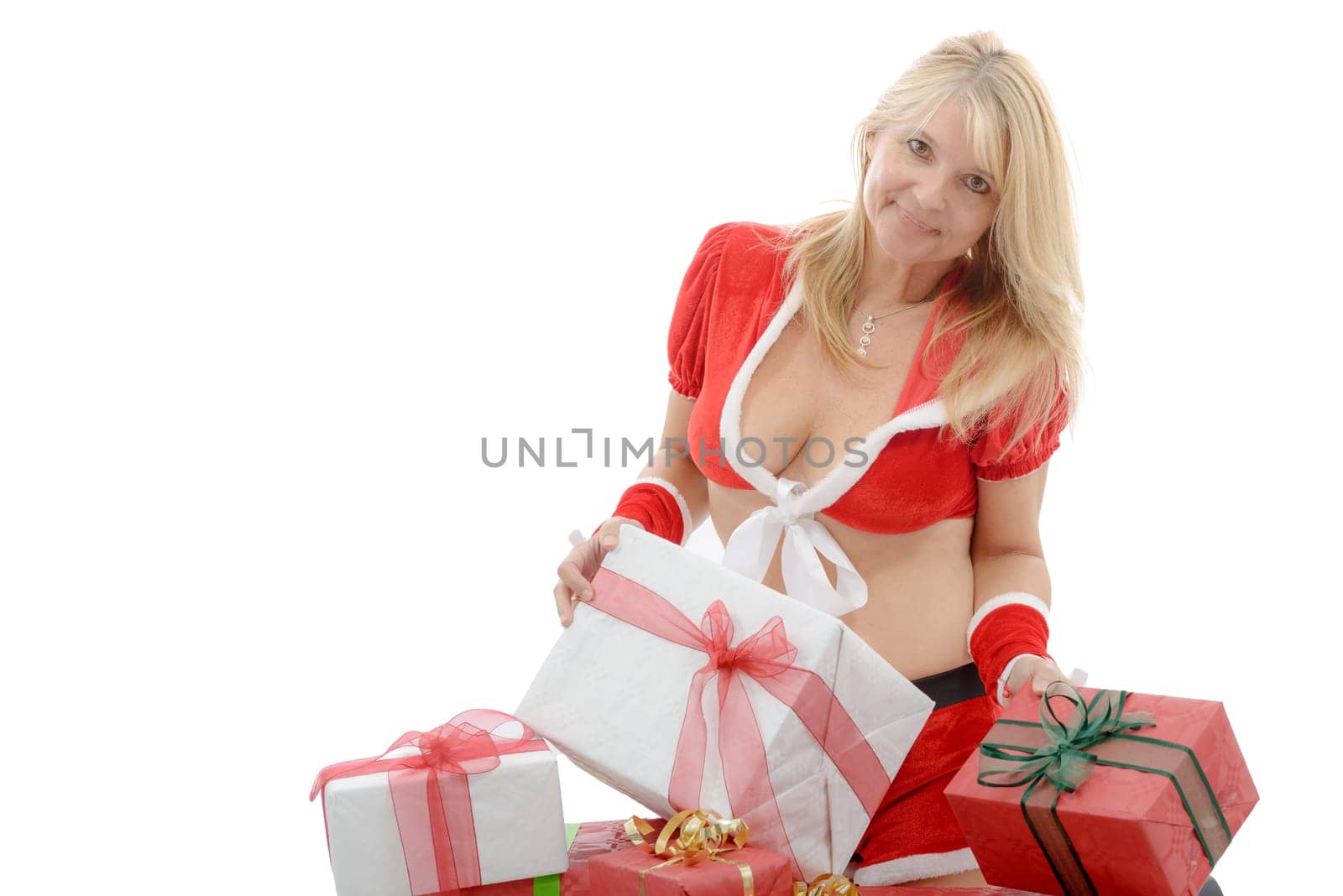 beautiful Santa woman holding a gift box