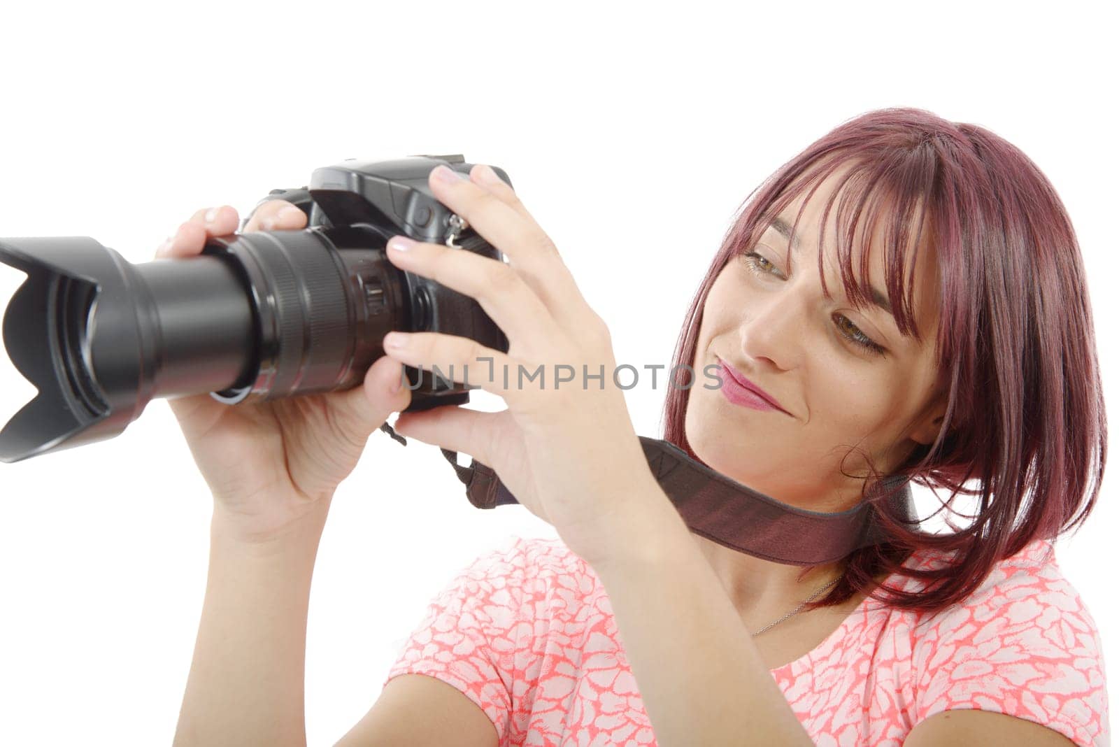 Young woman with photo camera. Isolated over white background