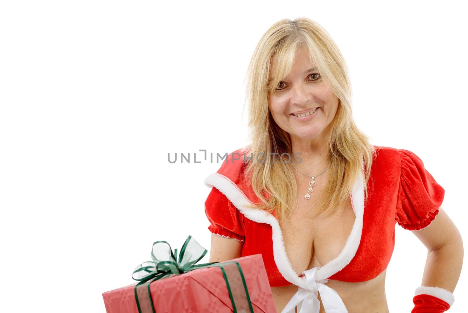 beautiful Santa woman holding a gift box