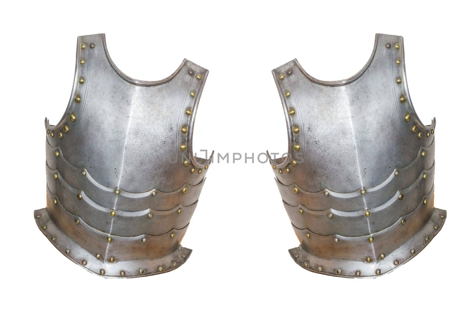 An ancient European knight's armor isolated against a white background.