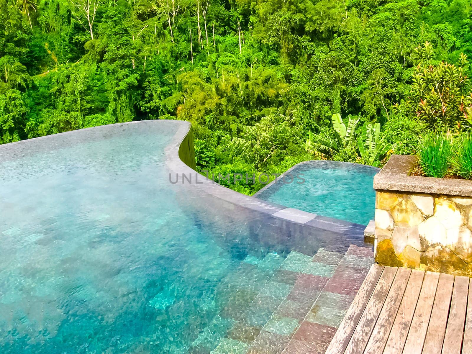 Bali, Indonesia - April 13, 2014: View of swimming pool at Ubud Hanging Gardens 5 stars hotel