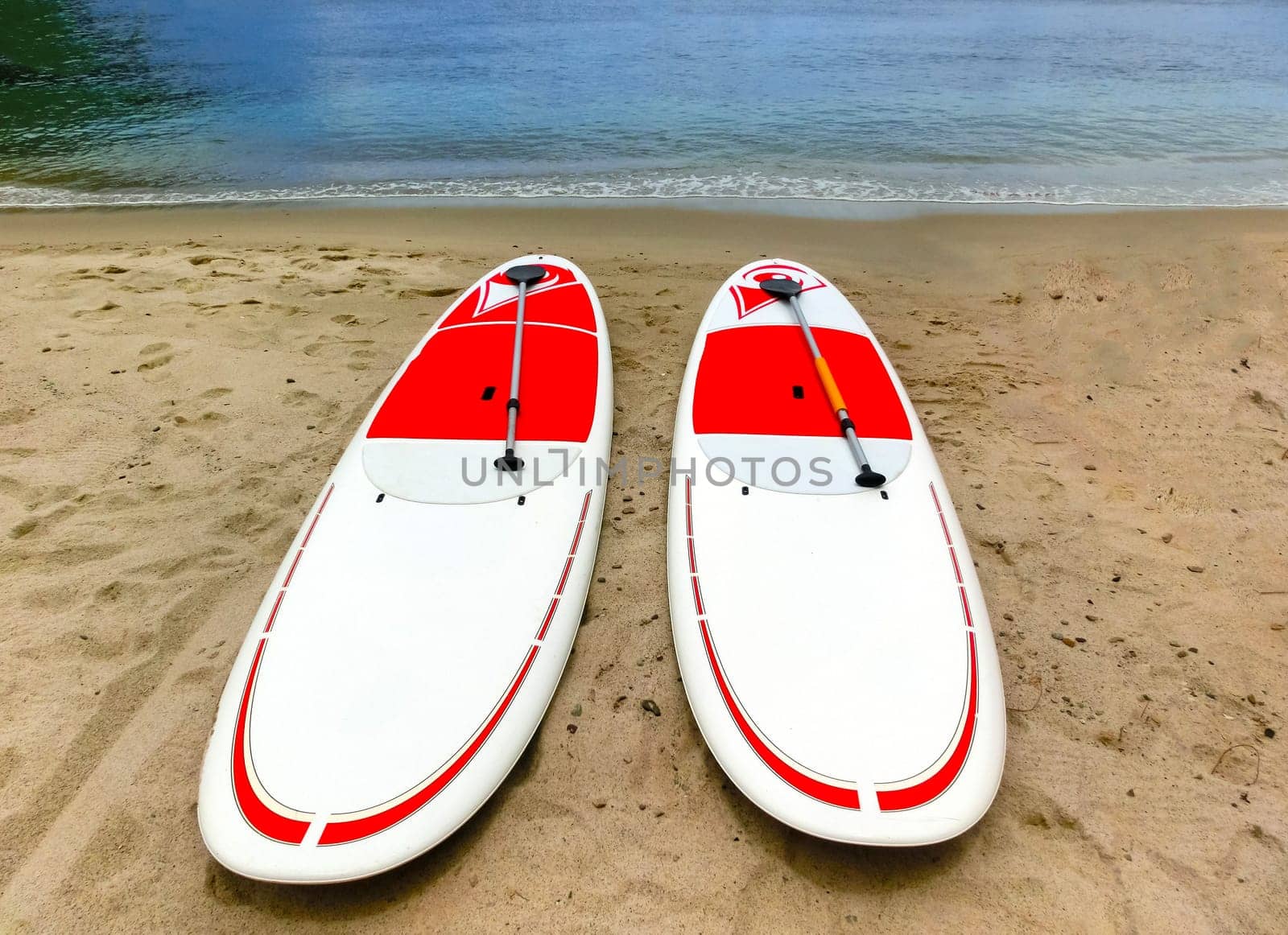 The colorful kayaks on the tropical beach