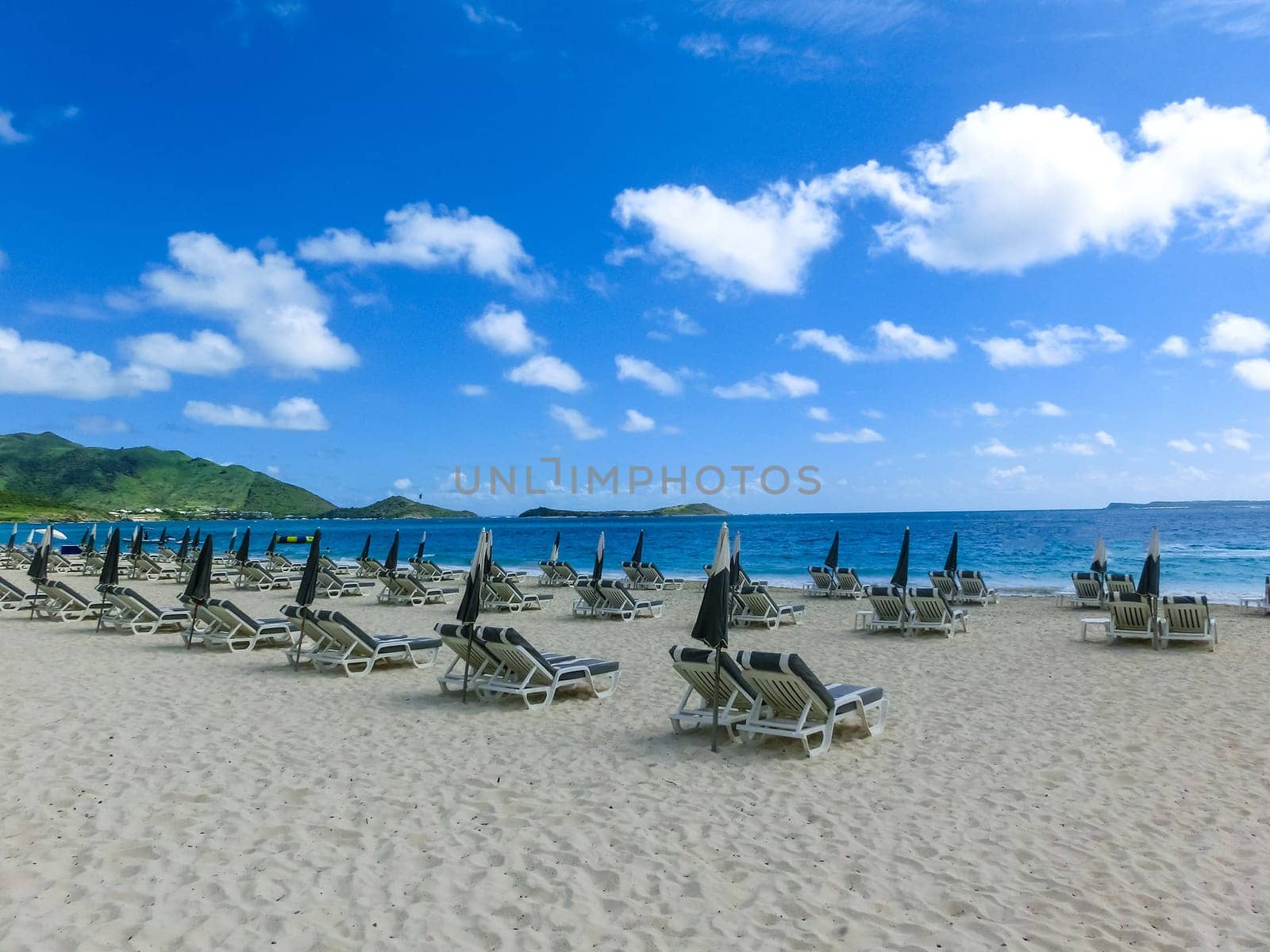 The chairs and umbrellas on Caribbean tropical beach