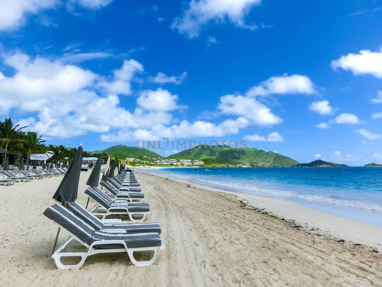 The chairs and umbrellas on Caribbean tropical beach
