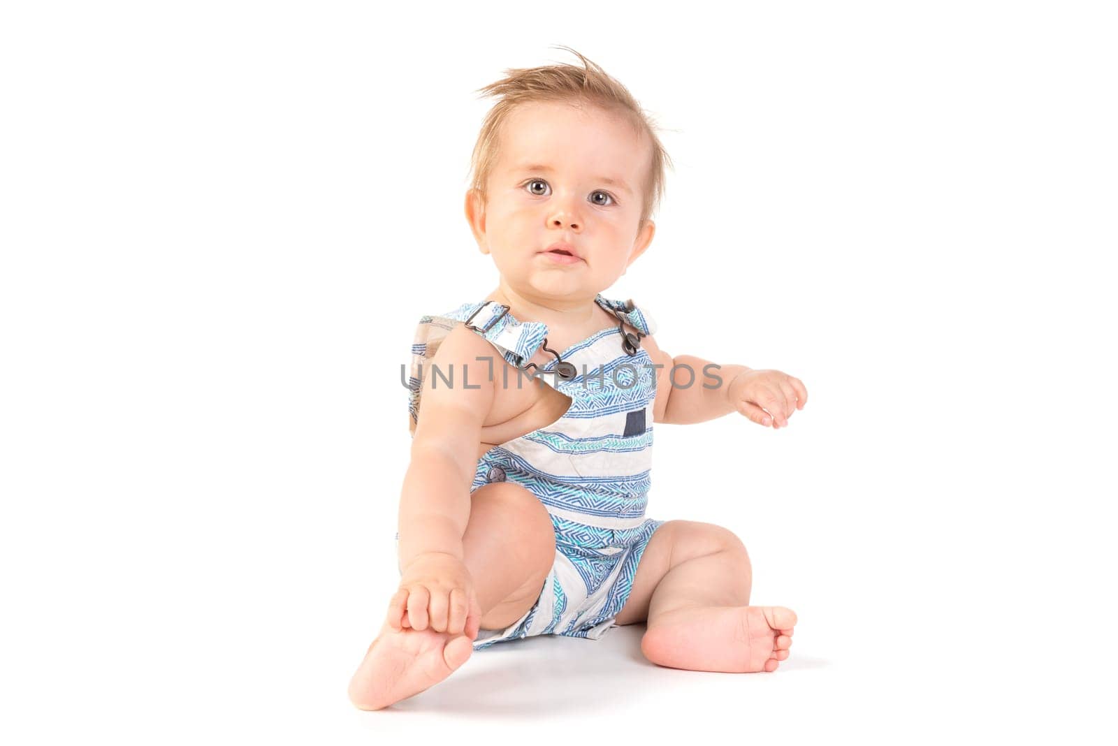 Beautiful baby posing isolated in white background