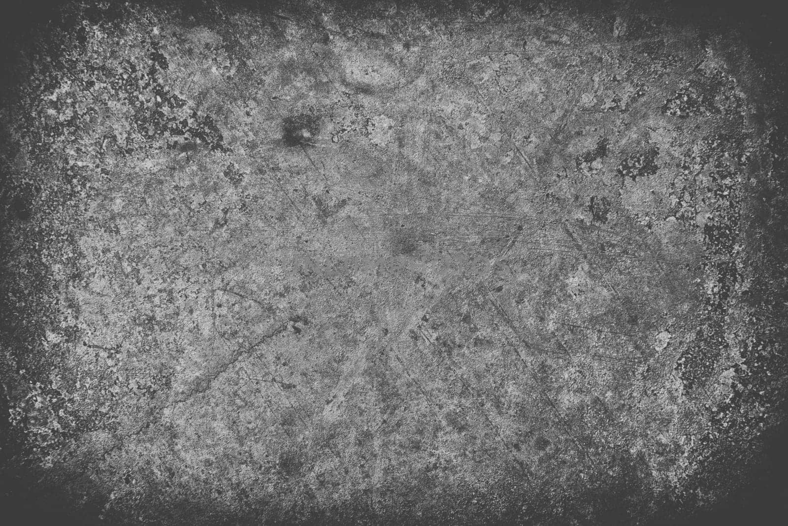 bright black scratched grunge wall background or texture