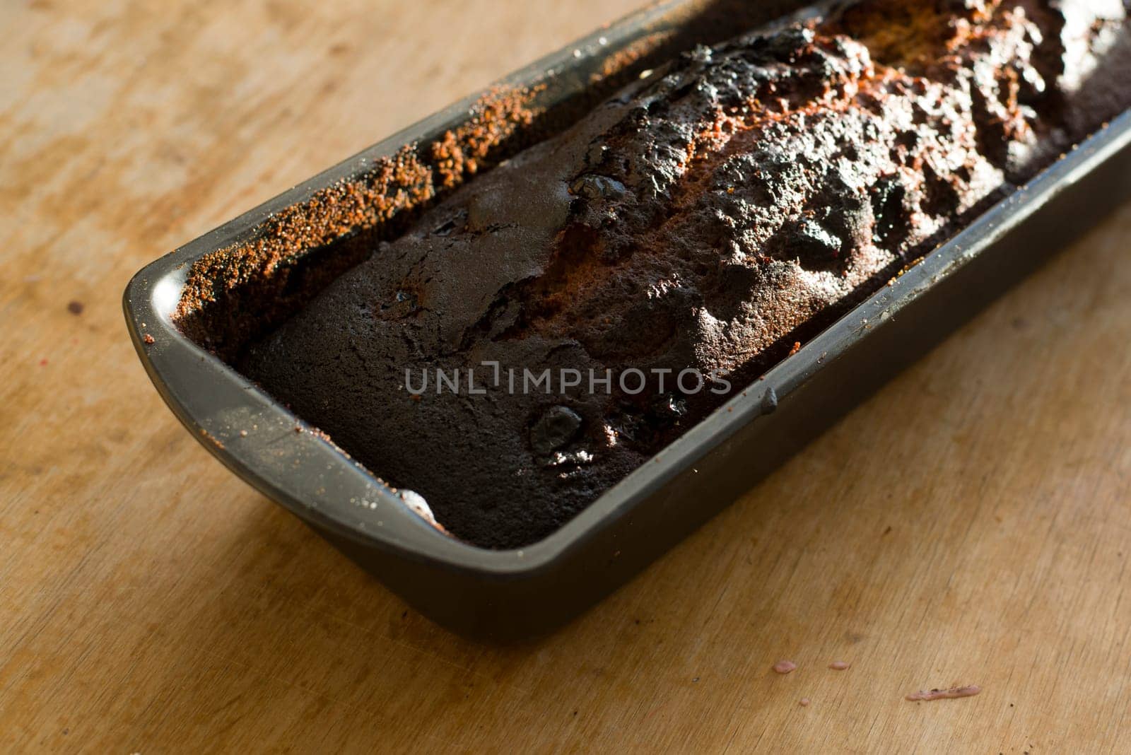 clos up on burned gingerbread on wood table