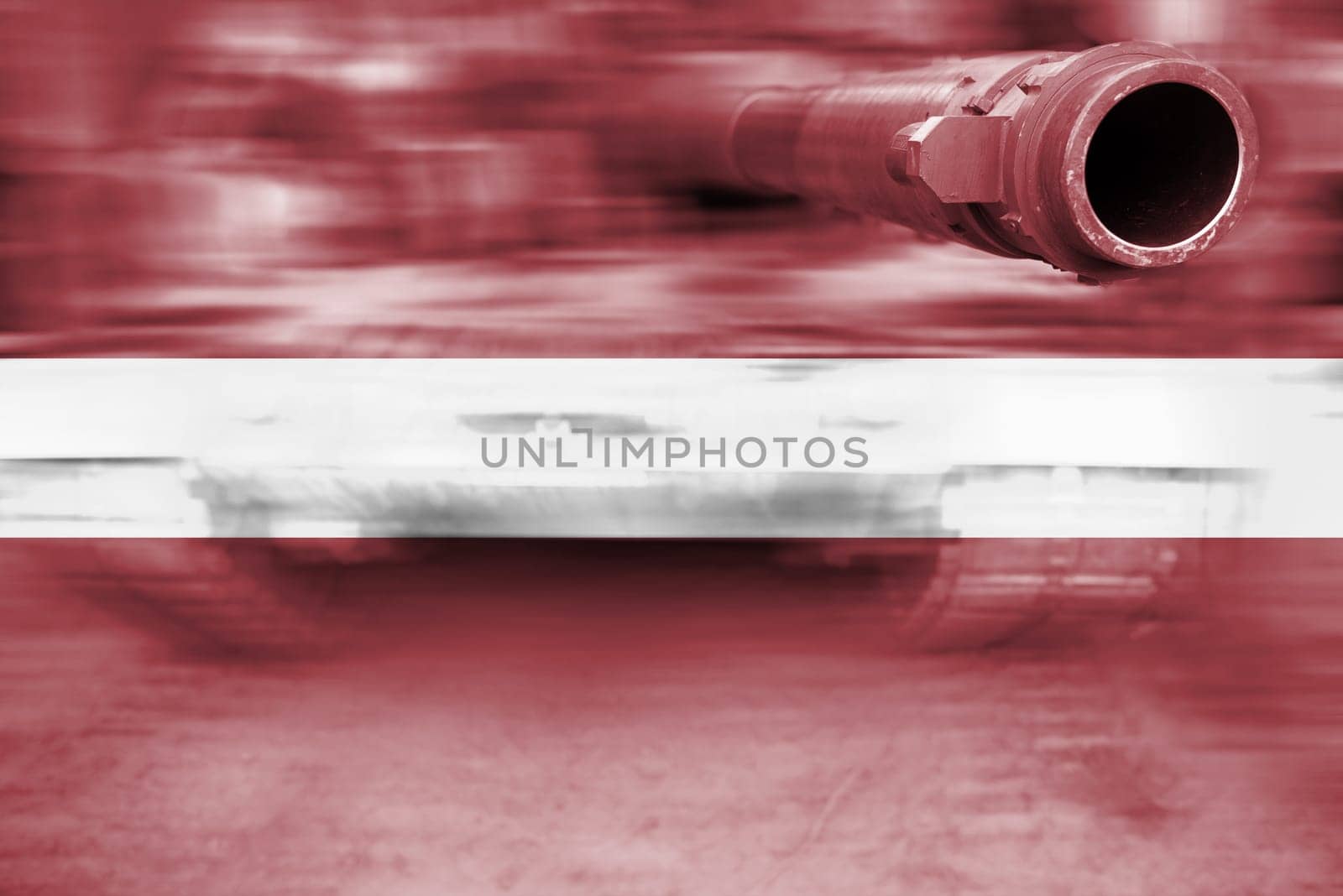 military strength theme,motion blur tank with latvia flag
