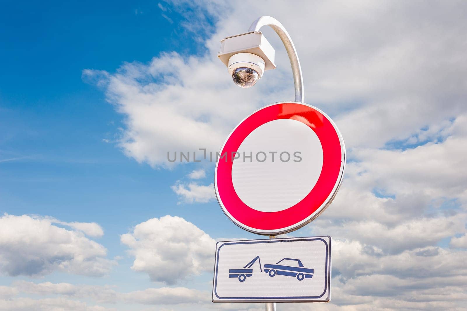 traffic is prohibited, road sign , with forced removal sign and car surveillance camera,CCTV