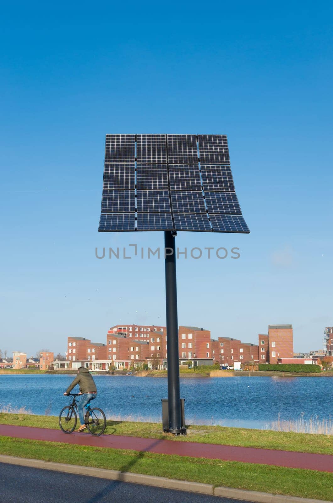 HEERHUGOWAARD, NETHERLANDS - JANUARY 23, 2016: Entrance of the city of the sun, the largest energy neutral residential area in the world. It produces as much energy as it consumes using 3.75 megawatt photovoltaic solar panels and 3 wind turbines