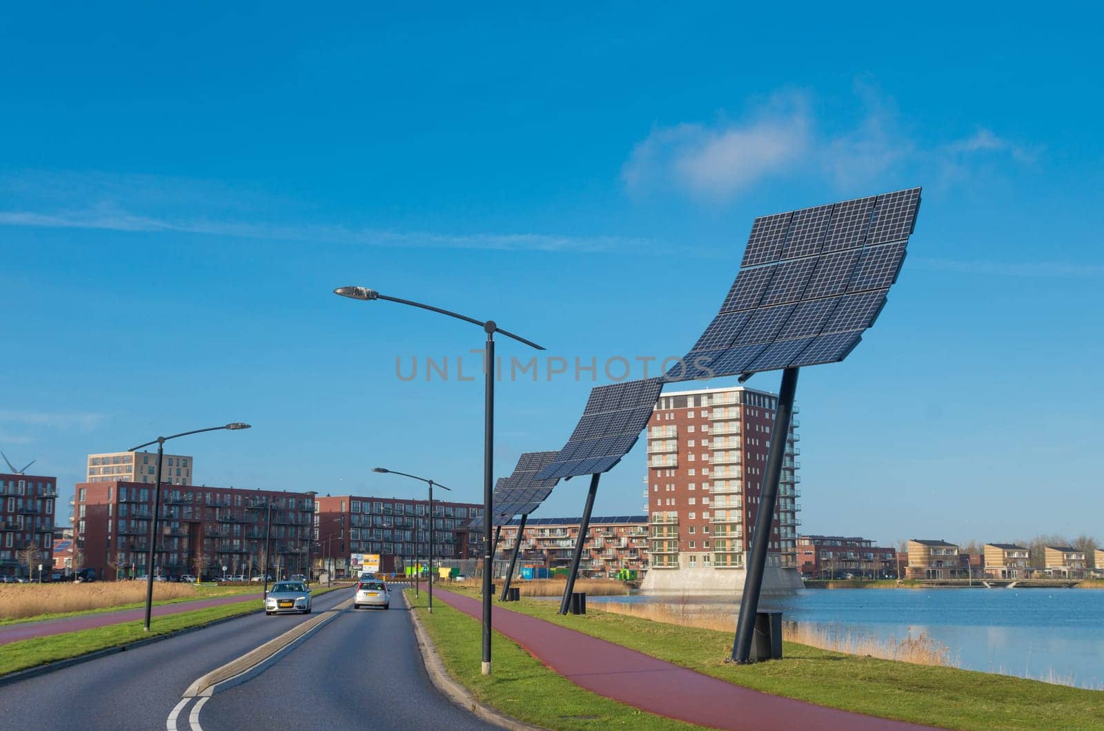 HEERHUGOWAARD, NETHERLANDS - JANUARY 23, 2016: Entrance of the city of the sun, the largest energy neutral residential area in the world. It produces as much energy as it consumes using 3.75 megawatt photovoltaic solar panels and 3 wind turbines