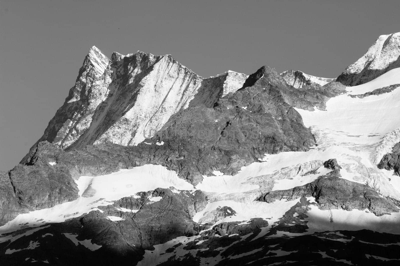 Swiss Alps - snow capped mountains and deep valleys, stunning view, breath-taking panorama