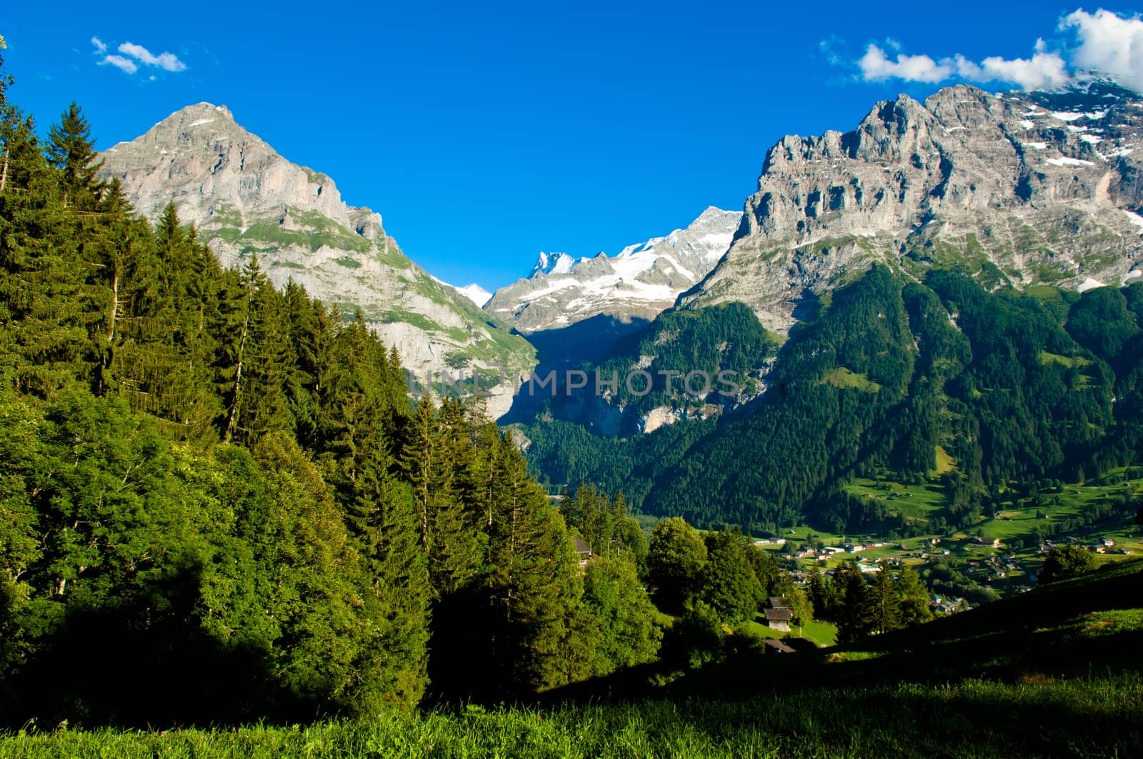 Swiss Alps - snow capped mountains and deep valleys, stunning view, breath-taking panorama