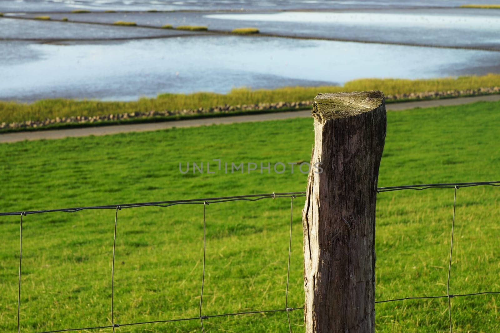 Fence on a dike