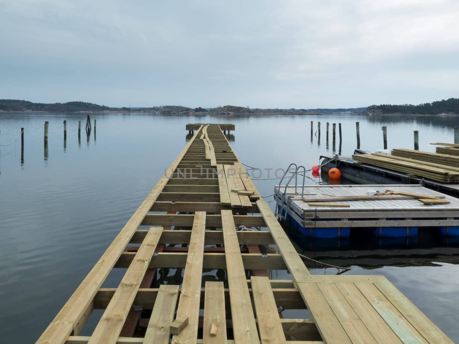 building a new jetty for the boat and for the people to take a bath or a swim
