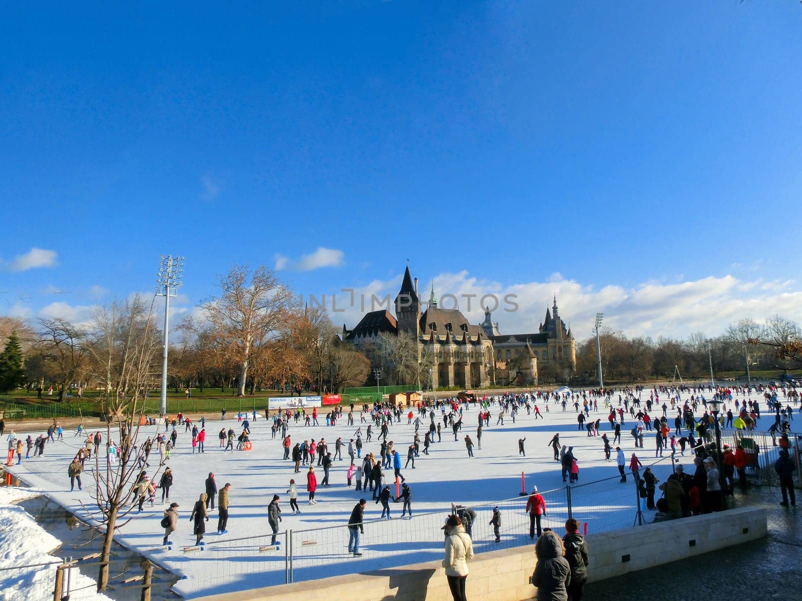 Budapest, Hungary - January, 04,2015: Ice skaters in City Park Ice Rink in Budapest, Hungary. Opened in 1870, it is the largest and one of the oldest ice rinks in Europe.