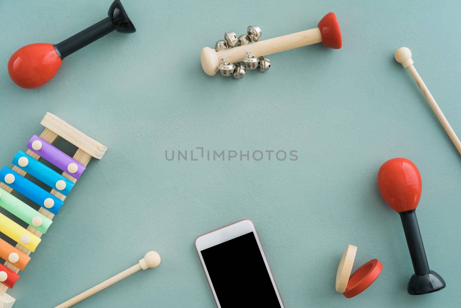 Collection of musical instruments with copyspace on turquoise