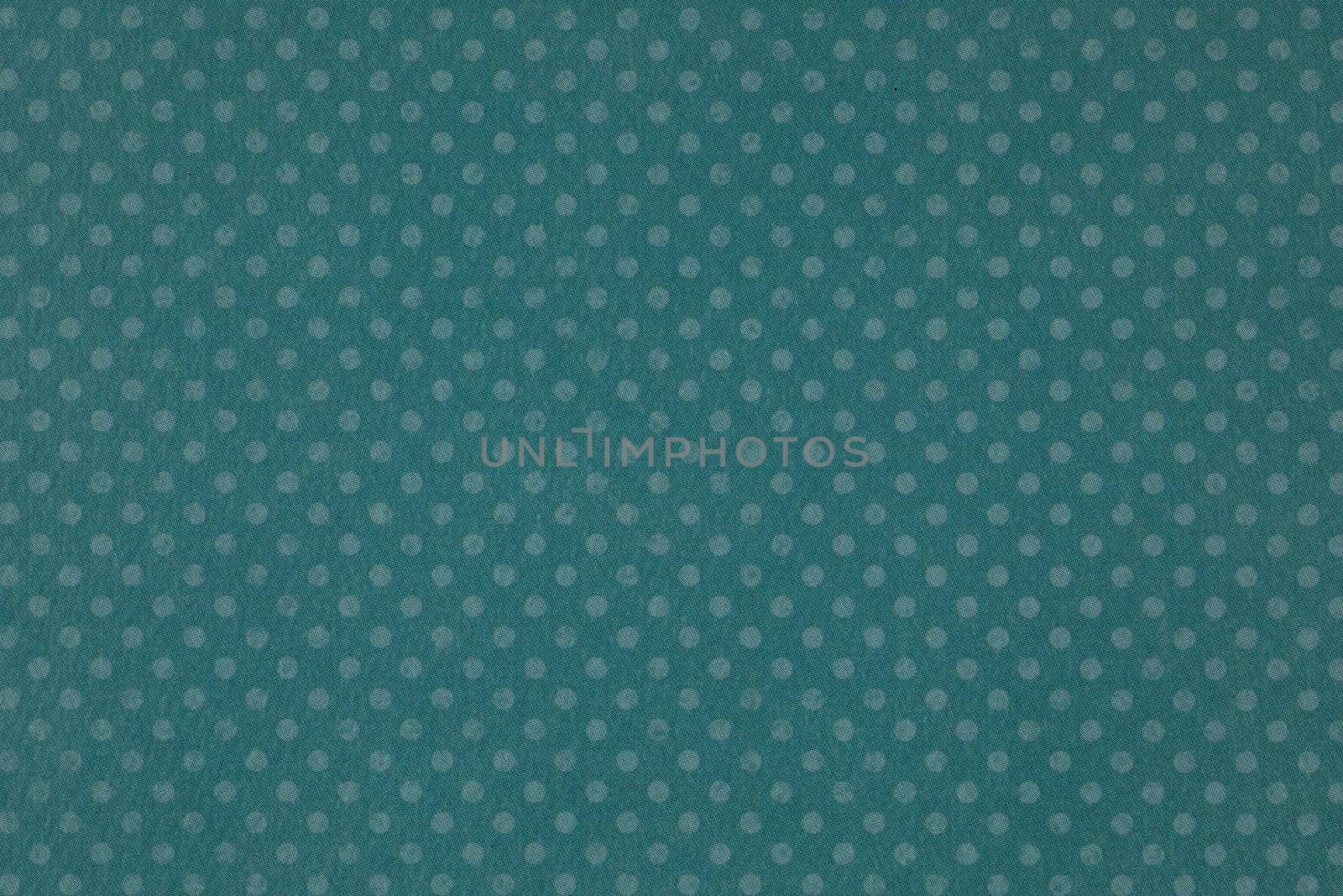Colorful polka dot paper background texture.