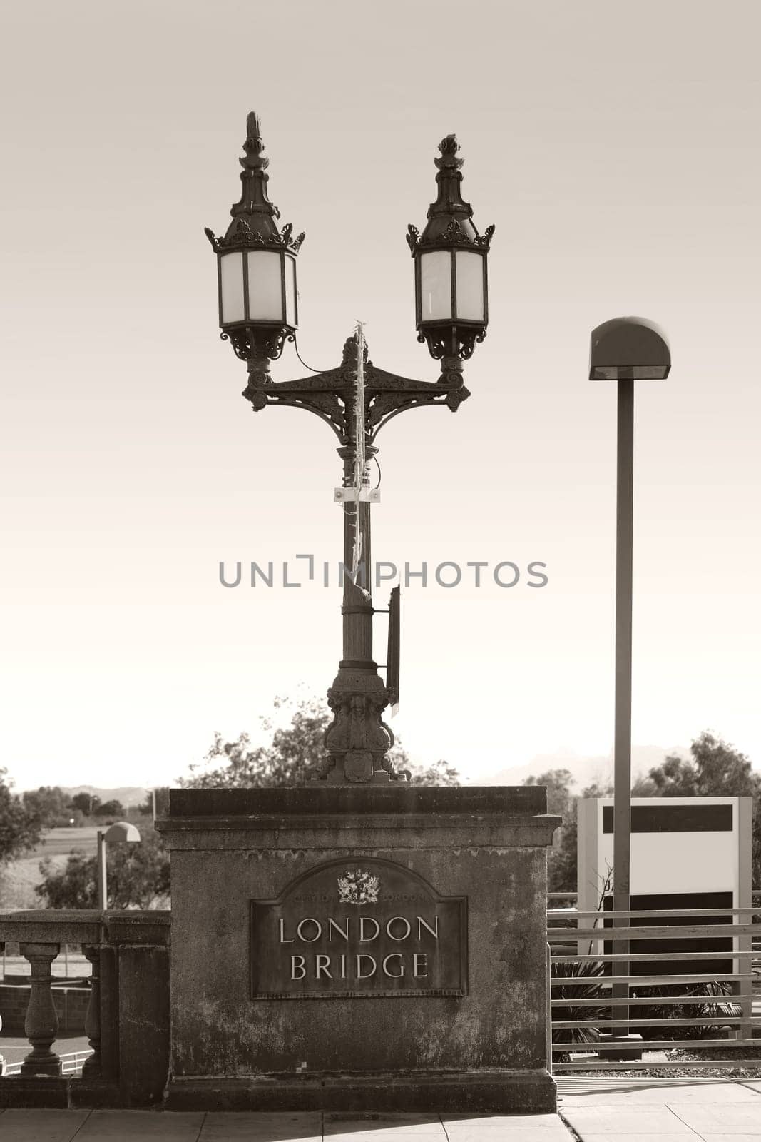 A pillar of the London Bridge in Lake Havasu City with a lantern.