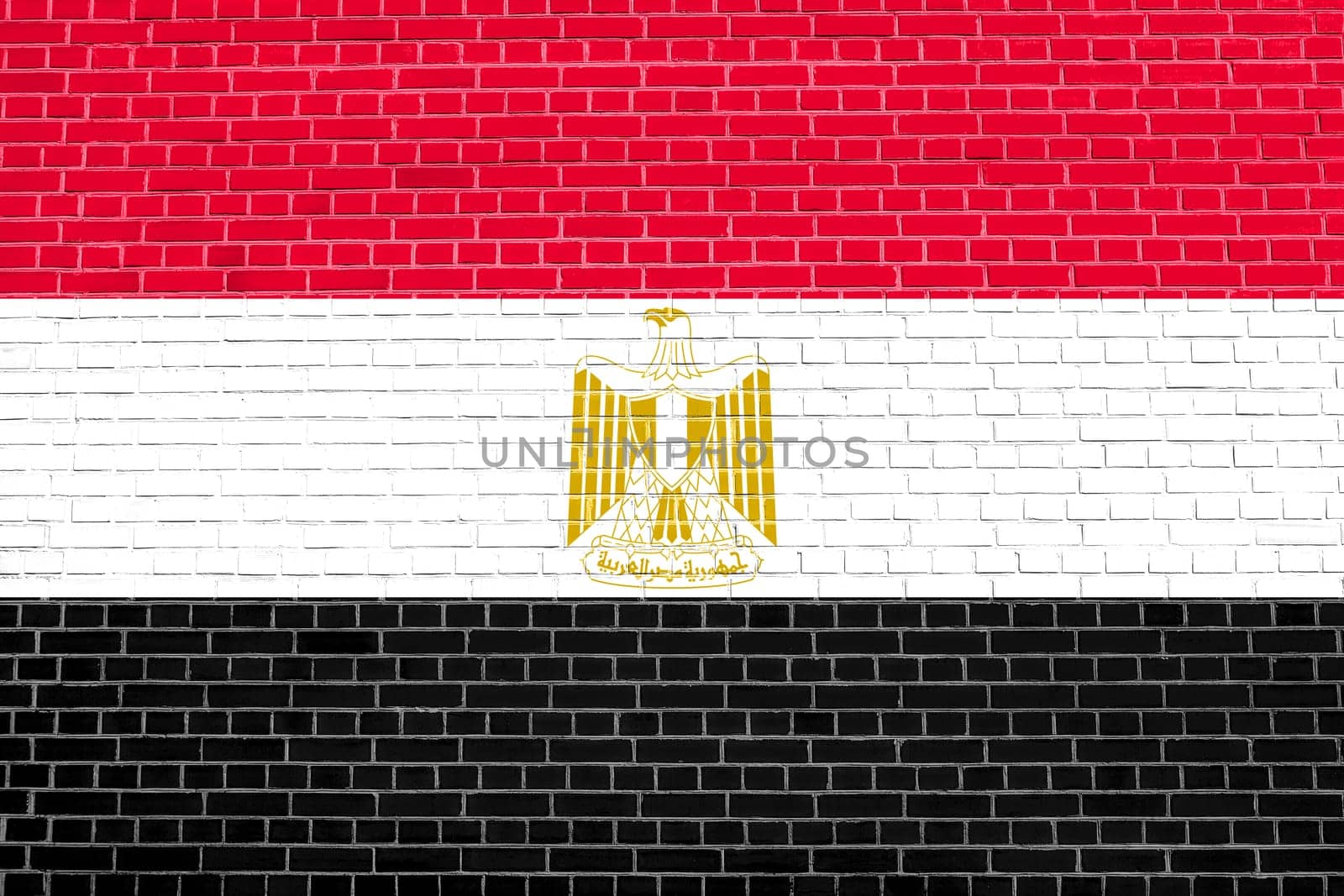 Egyptian national official flag. Arab Republic of Egypt patriotic symbol, banner, element, background. Flag of Egypt on brick wall texture background