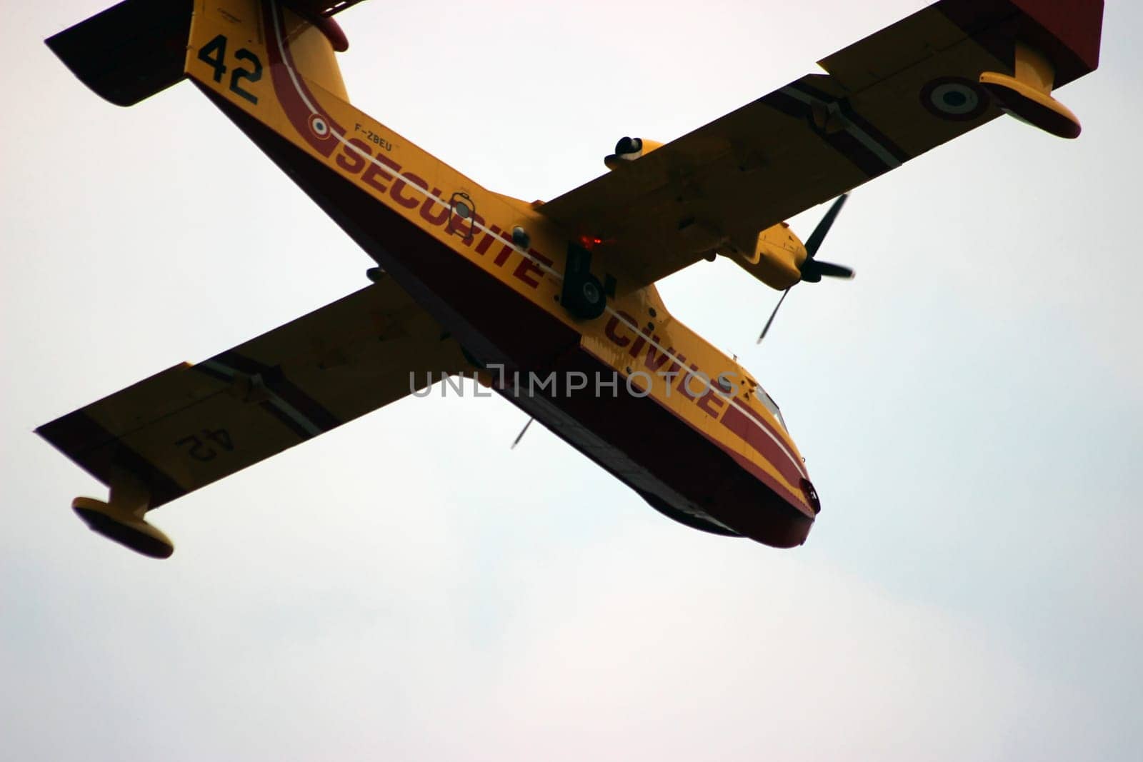 Menton, France - September 9, 2015: Canadair CL-415 (Securite Civile) Airplane Extinguish Forest in Flame in Menton, French Riviera