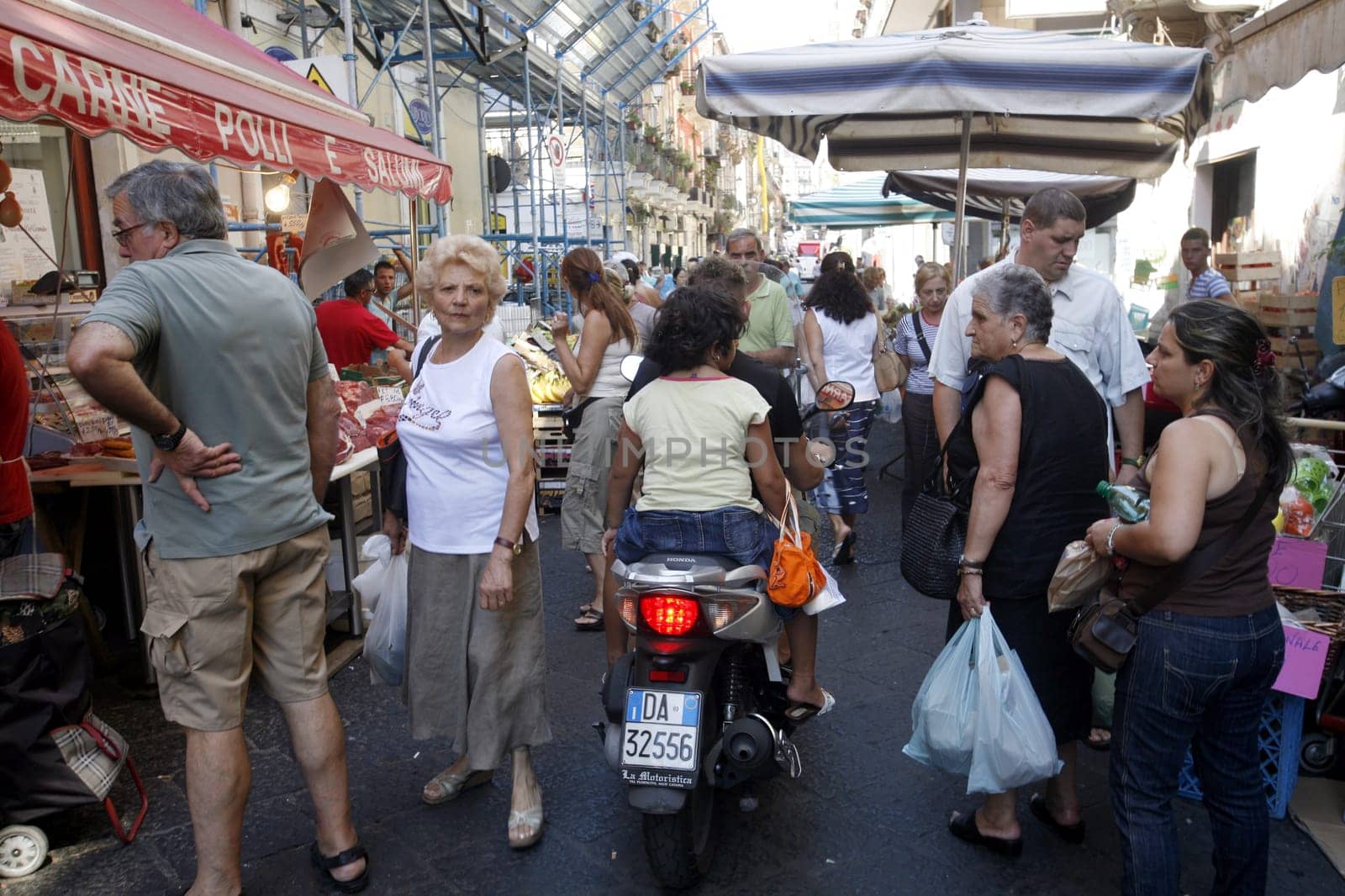 the fegetable and food market in the old town of Catania in Sicily in south Italy in Europe.