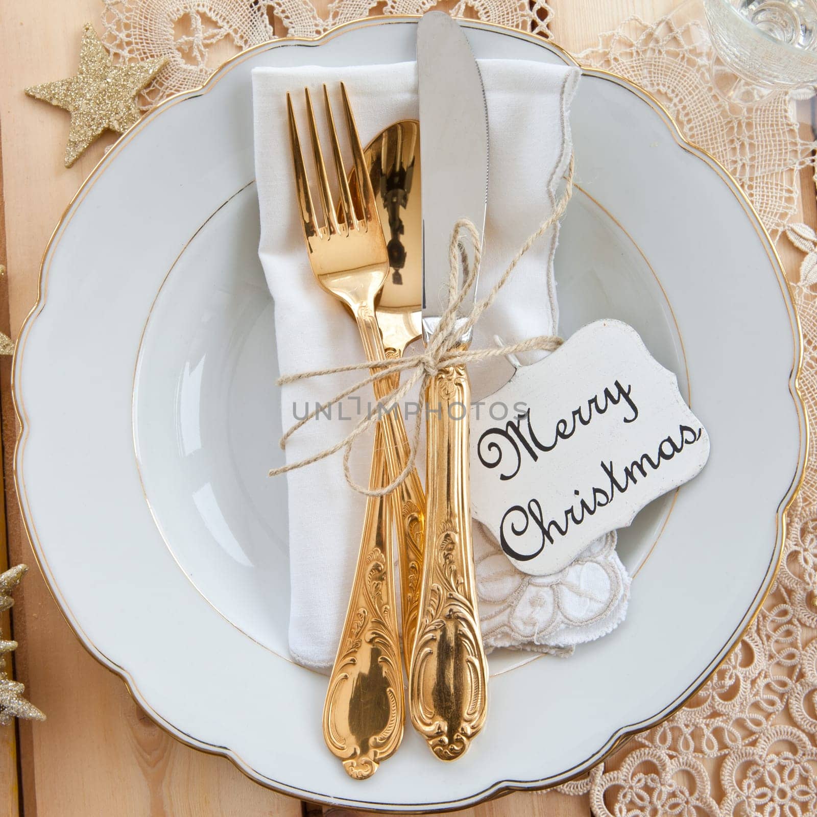 Vintage cover for Christmas with golden cutlery
