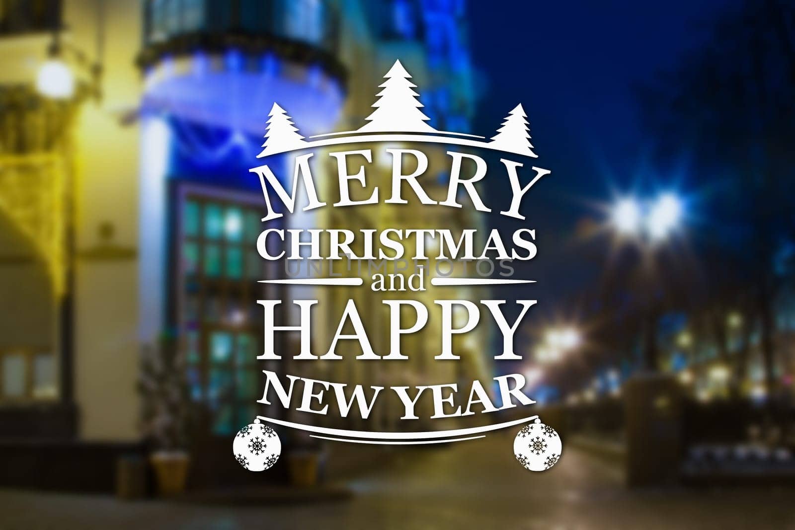 Merry Christmas and New Year greeting card on blurred night city streets illuminated buildings background