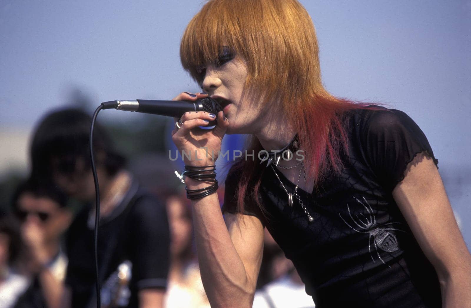 a Japanese Youth Punk Band plays on a square in the City of Tokyo in Japan in Asia,....