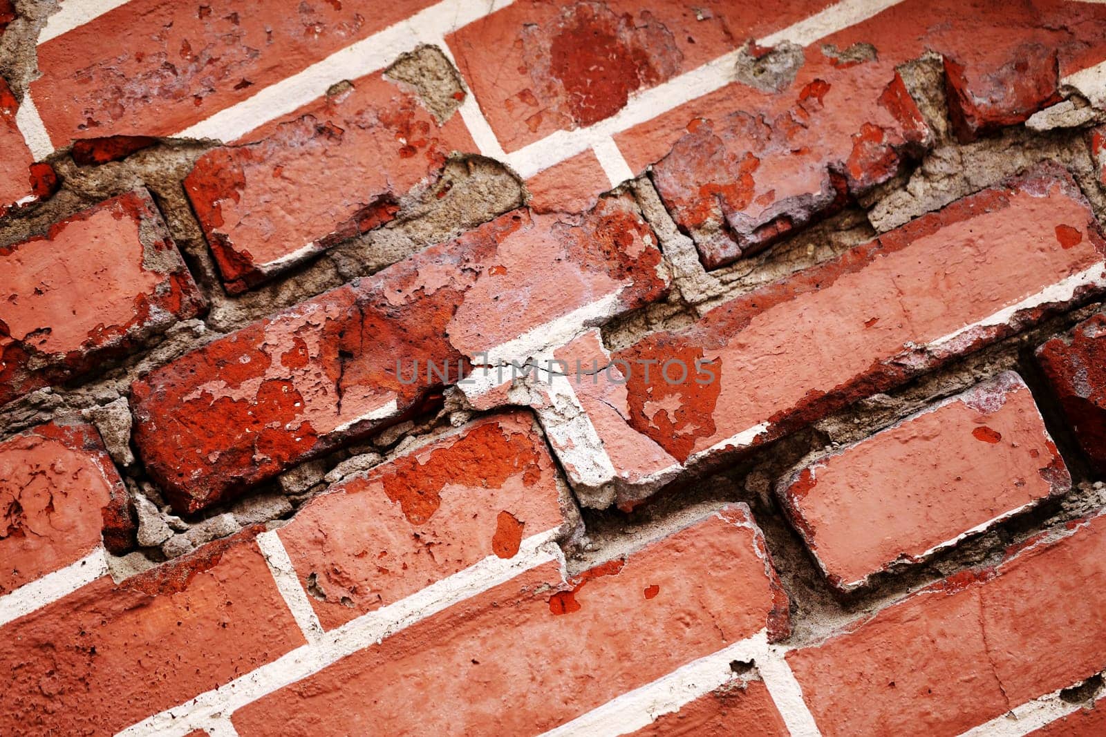 texture of red brick wall photographed close up