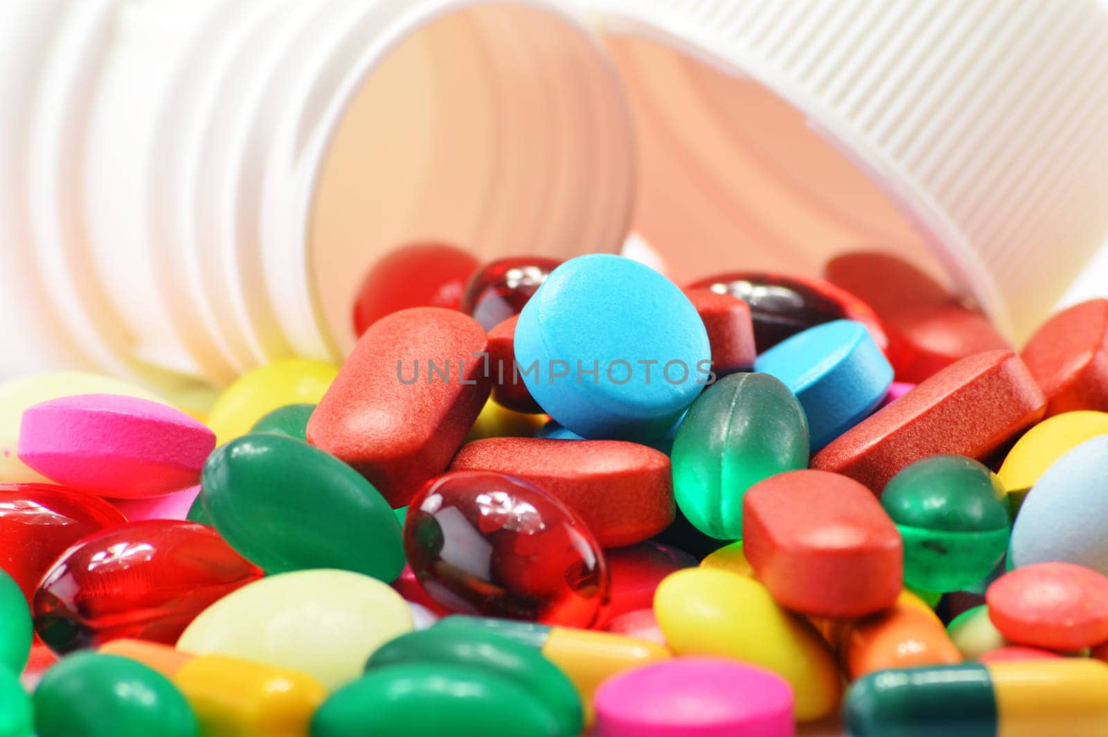 Composition with variety of drug pills and container