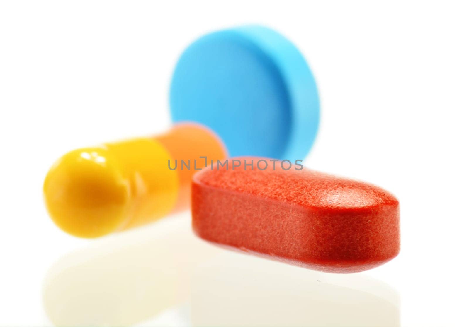 Composition with variety of drug pills and container