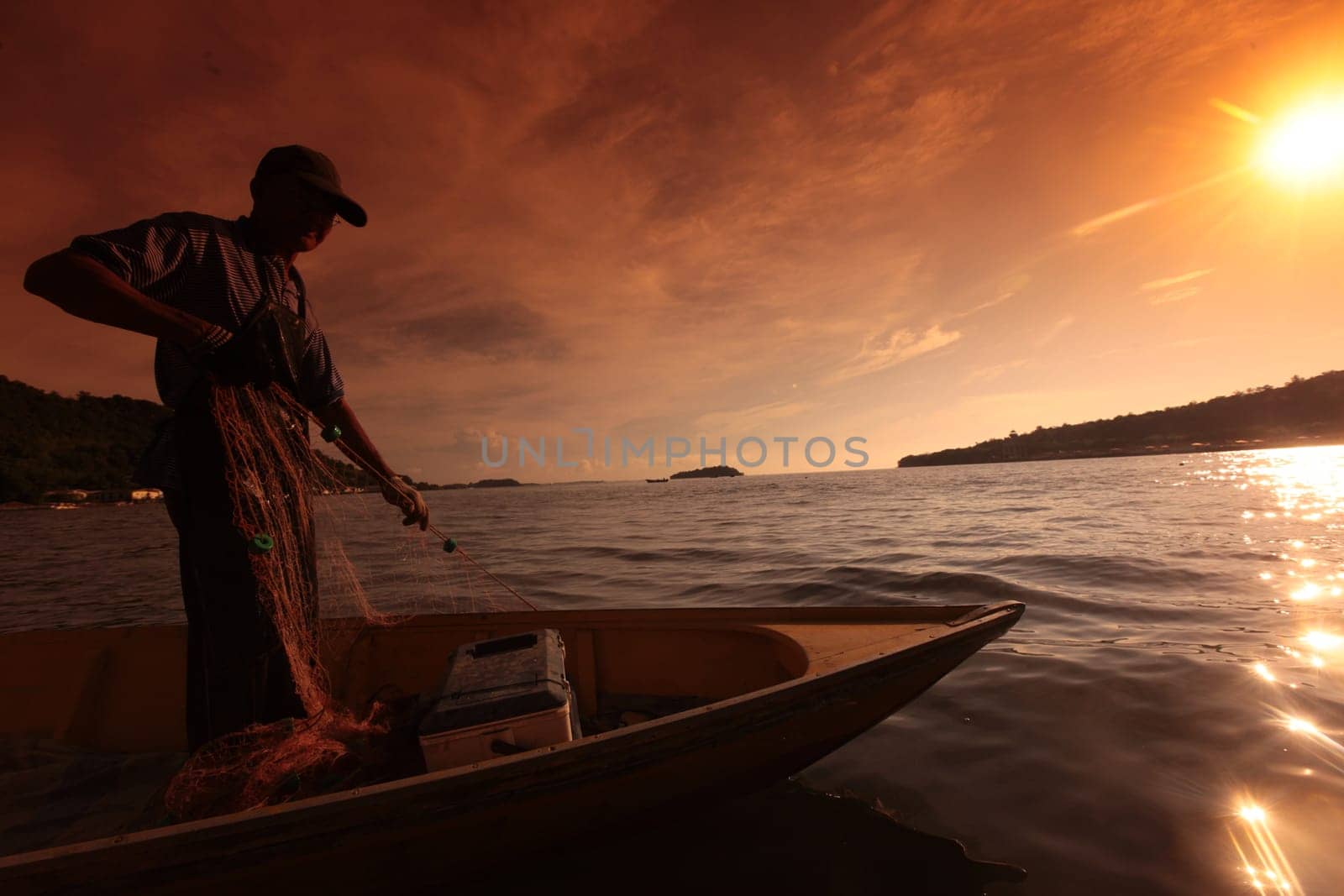 a fishermen on the coast near the city of Bandar seri Begawan in the country of Brunei Darussalam on Borneo in Southeastasia.