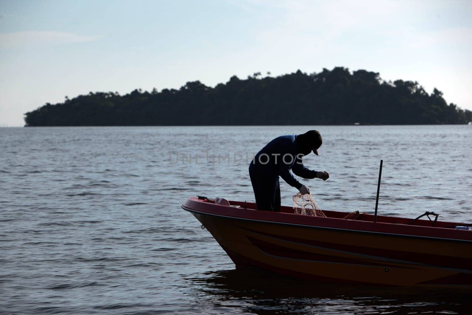a fishermen on the coast near the city of Bandar seri Begawan in the country of Brunei Darussalam on Borneo in Southeastasia.