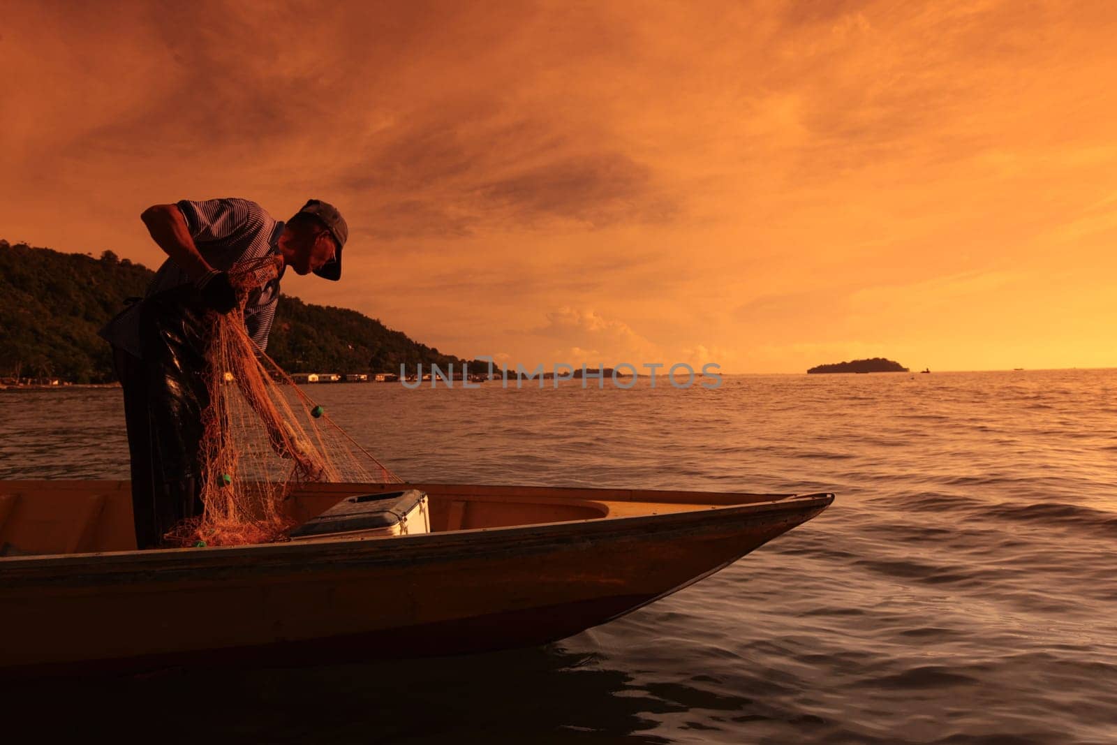 a fishermen on the coast near the city of Bandar seri Begawan in the country of Brunei Darussalam on Borneo in Southeastasia.