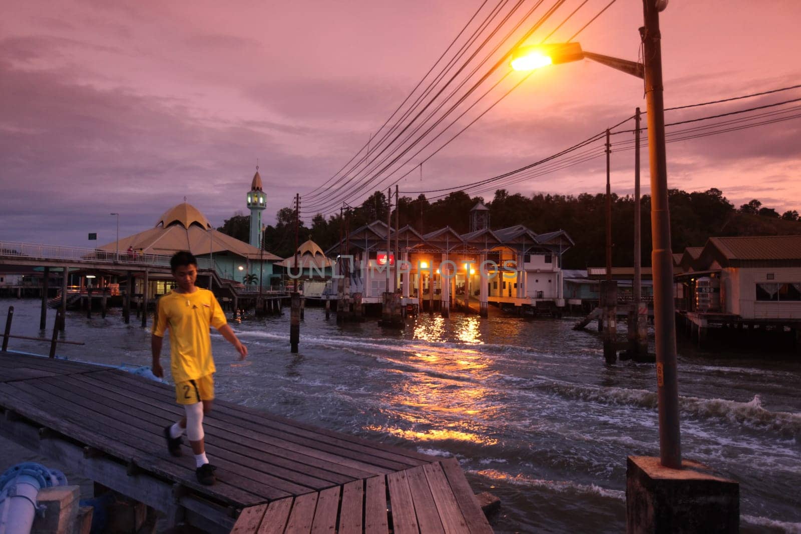 the water village and town of Kampung Ayer in the city of Bandar seri Begawan in the country of Brunei Darussalam on Borneo in Southeastasia.