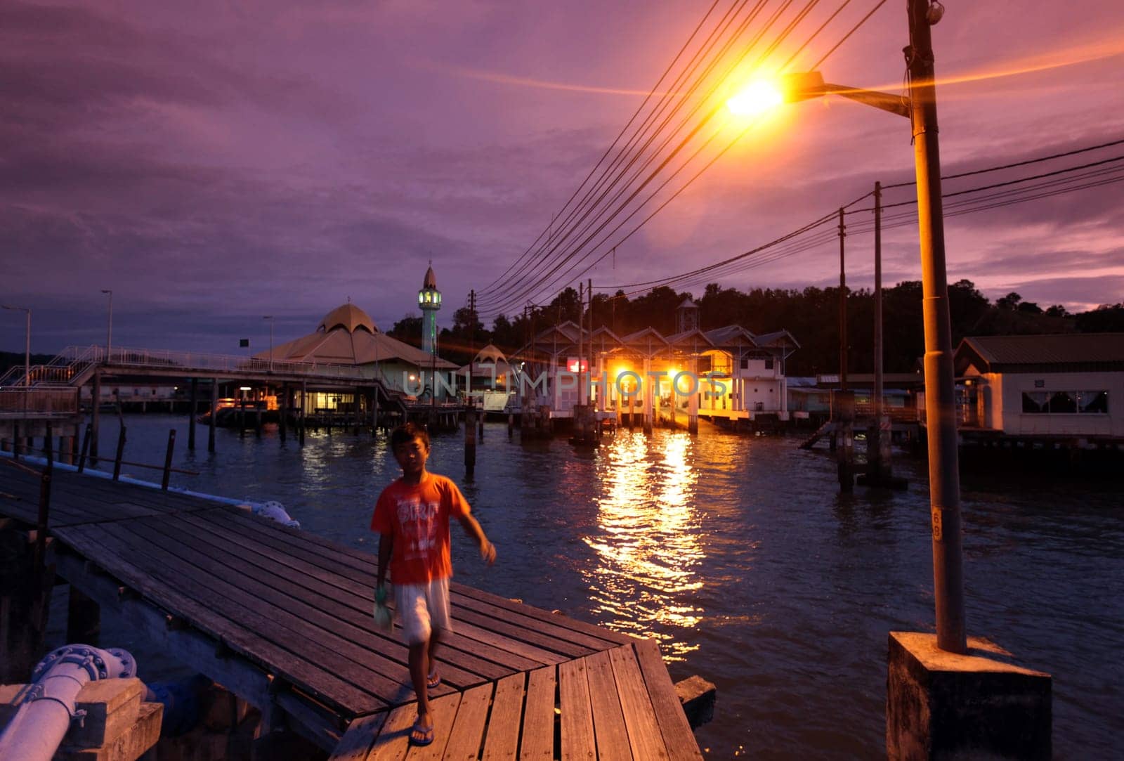 the water village and town of Kampung Ayer in the city of Bandar seri Begawan in the country of Brunei Darussalam on Borneo in Southeastasia.