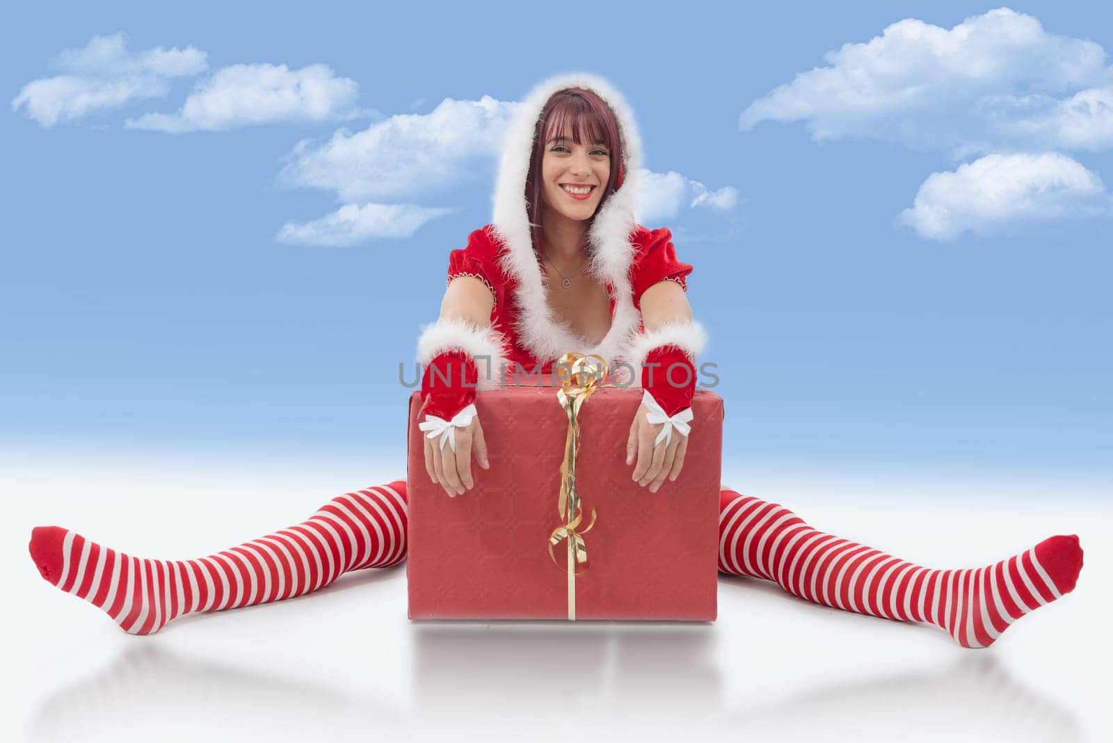 a beautiful sexy girl wearing santa claus clothes