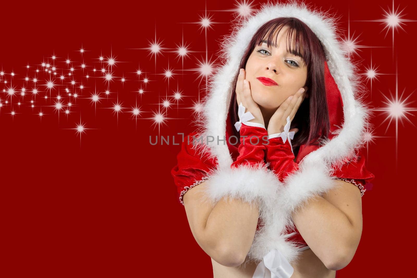 a portrait of beautiful sexy girl wearing santa claus clothes