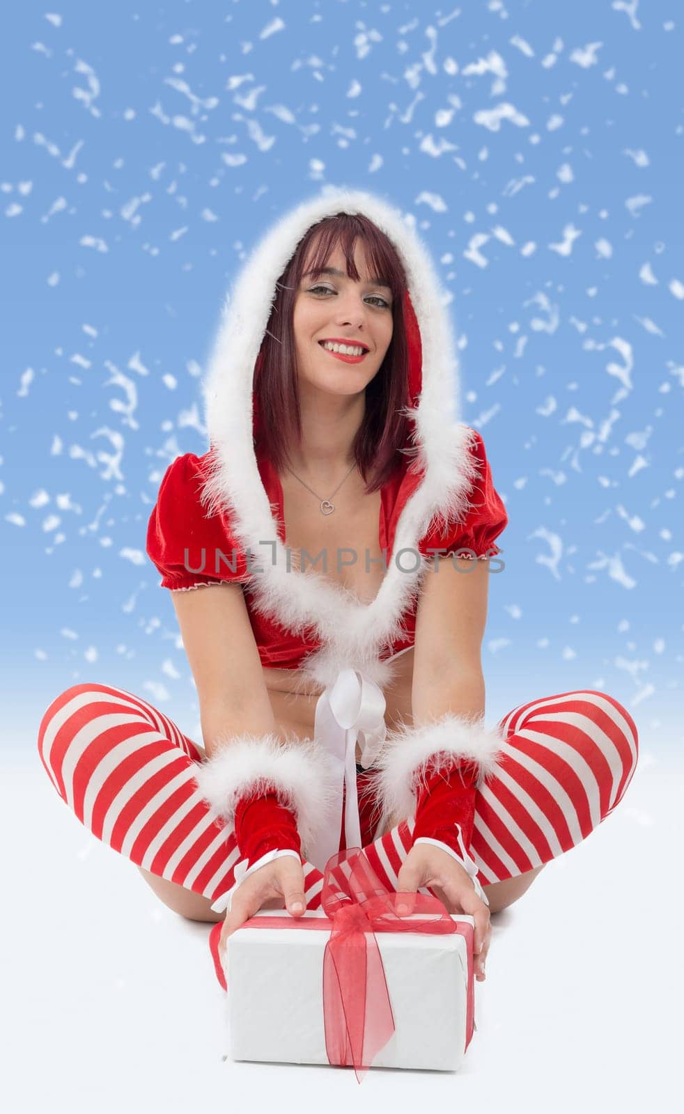 a beautiful sexy girl wearing santa claus clothes