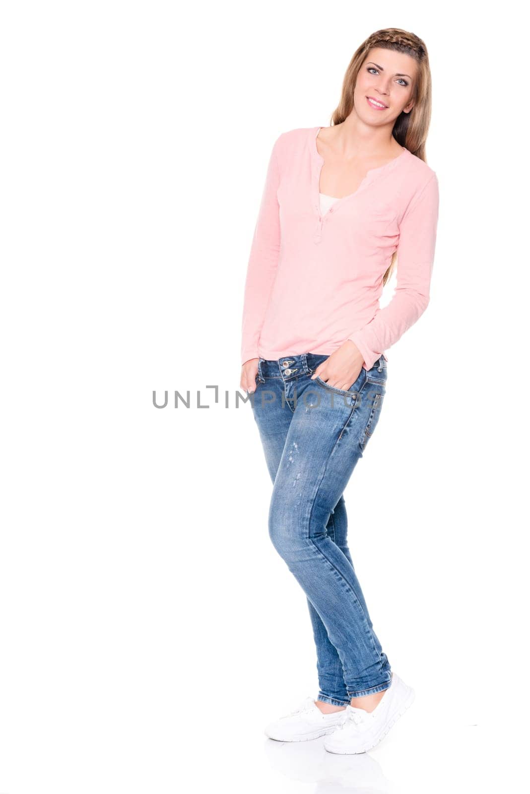 Full body shot of a young woman against a white background