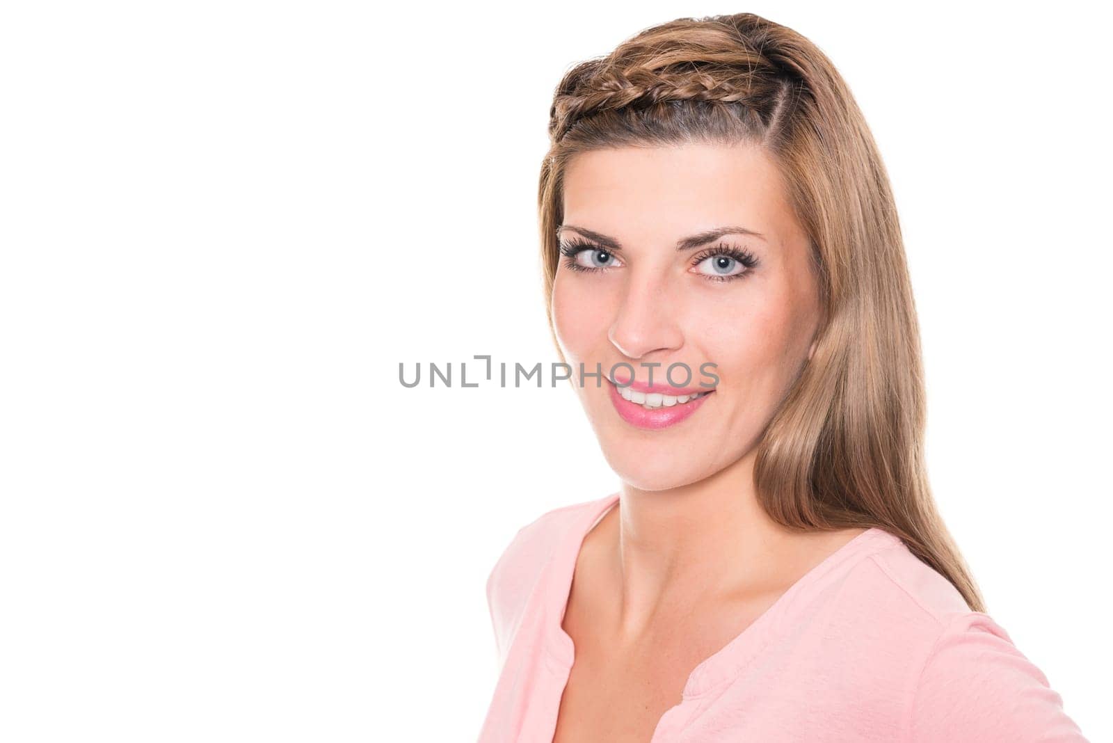 Portrait of a young woman against a white background