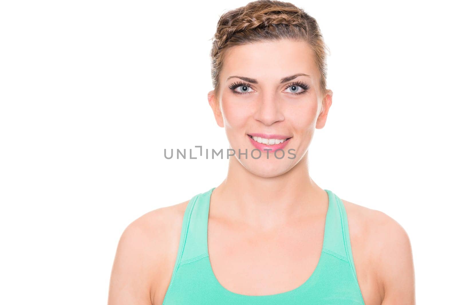 Studio recording of a young woman playing sports against a white background