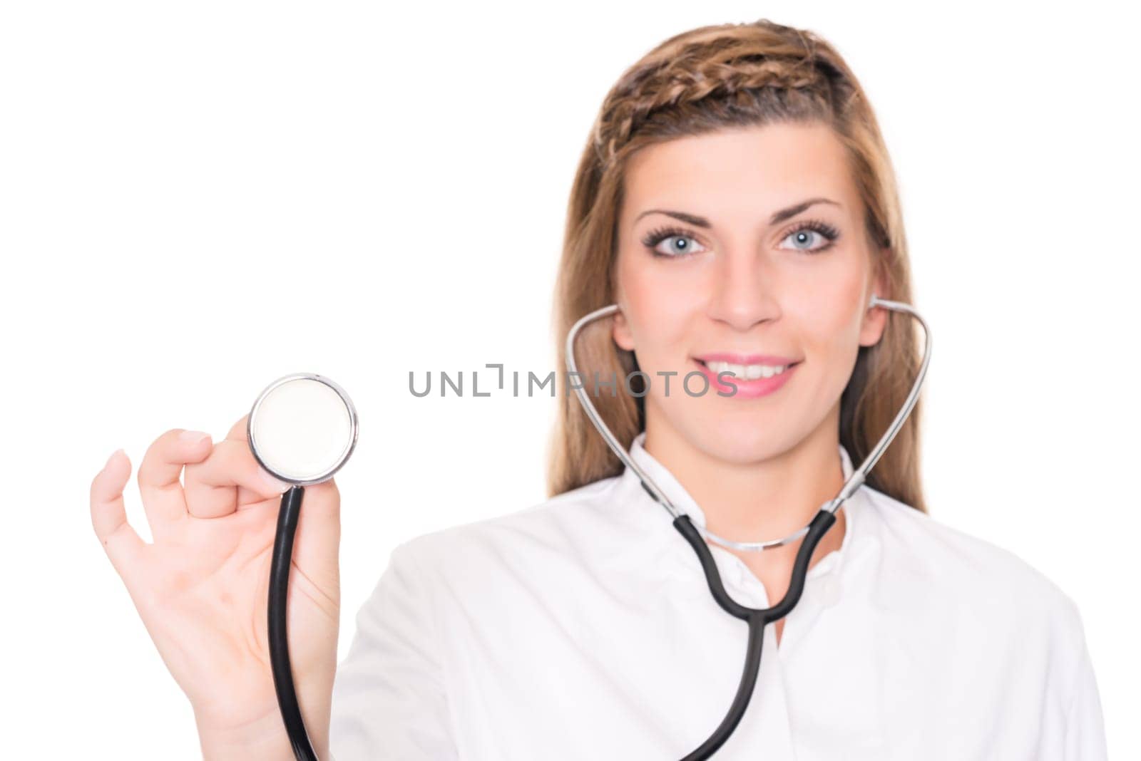 Studio recording of a young doctor against a white background
