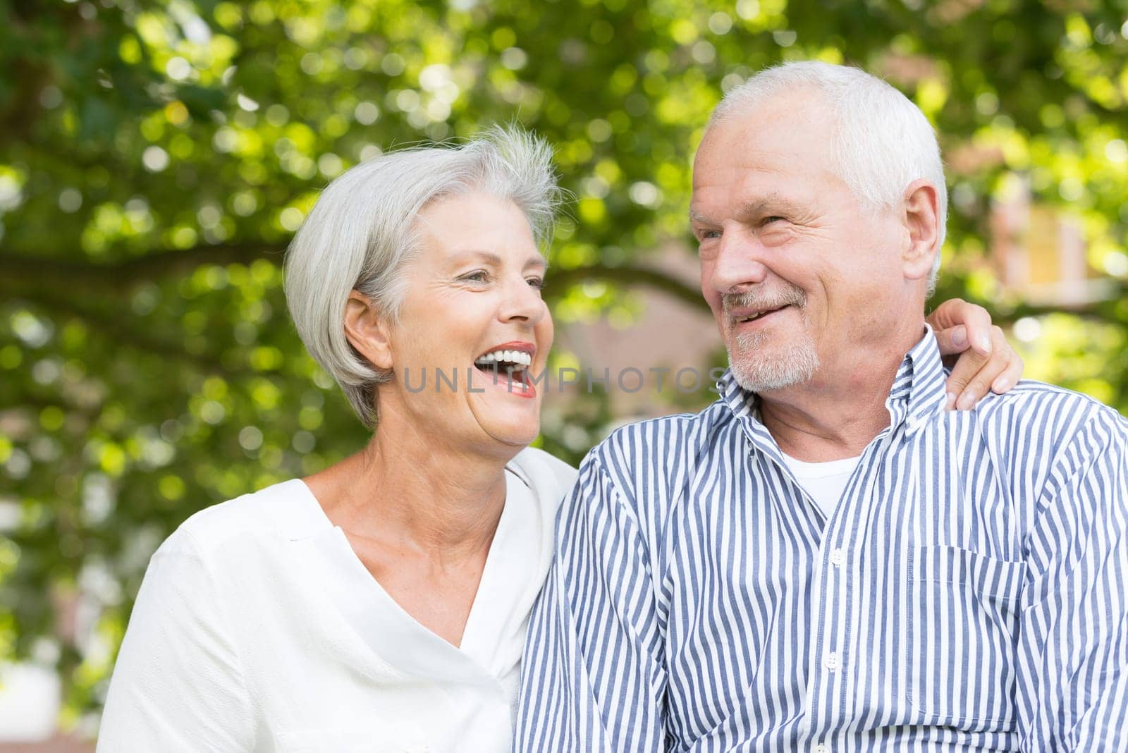 Active senior couple in a park