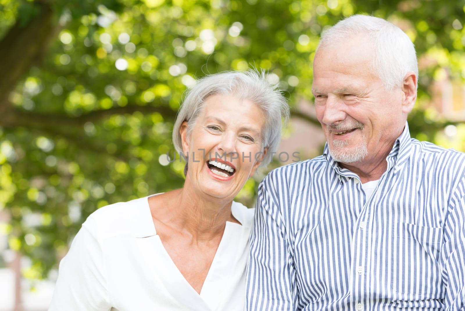 Active senior couple in a park