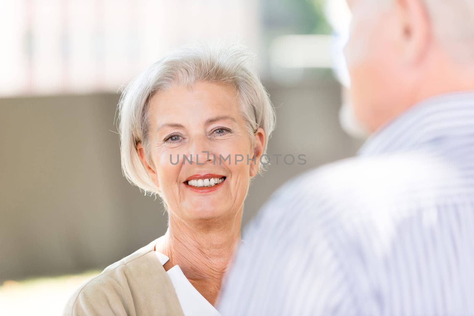 Active senior couple against an urban background